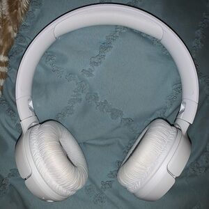 White JBL wireless headphones